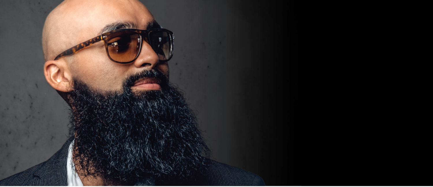 Taming the Beast: 5 Tips for Managing Your Curly Beard